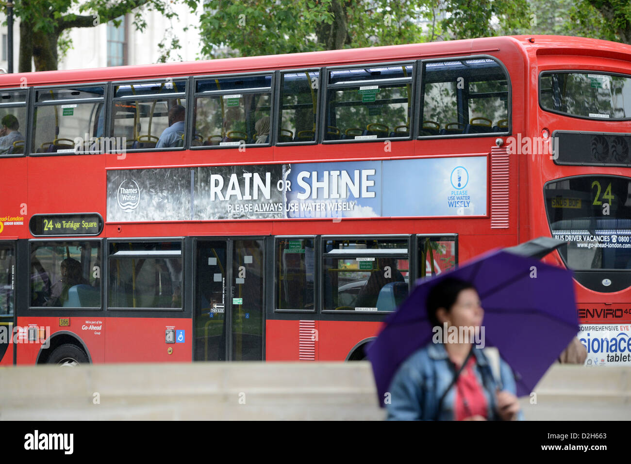 Bus in London with Rain or Shine sign Stock Photo
