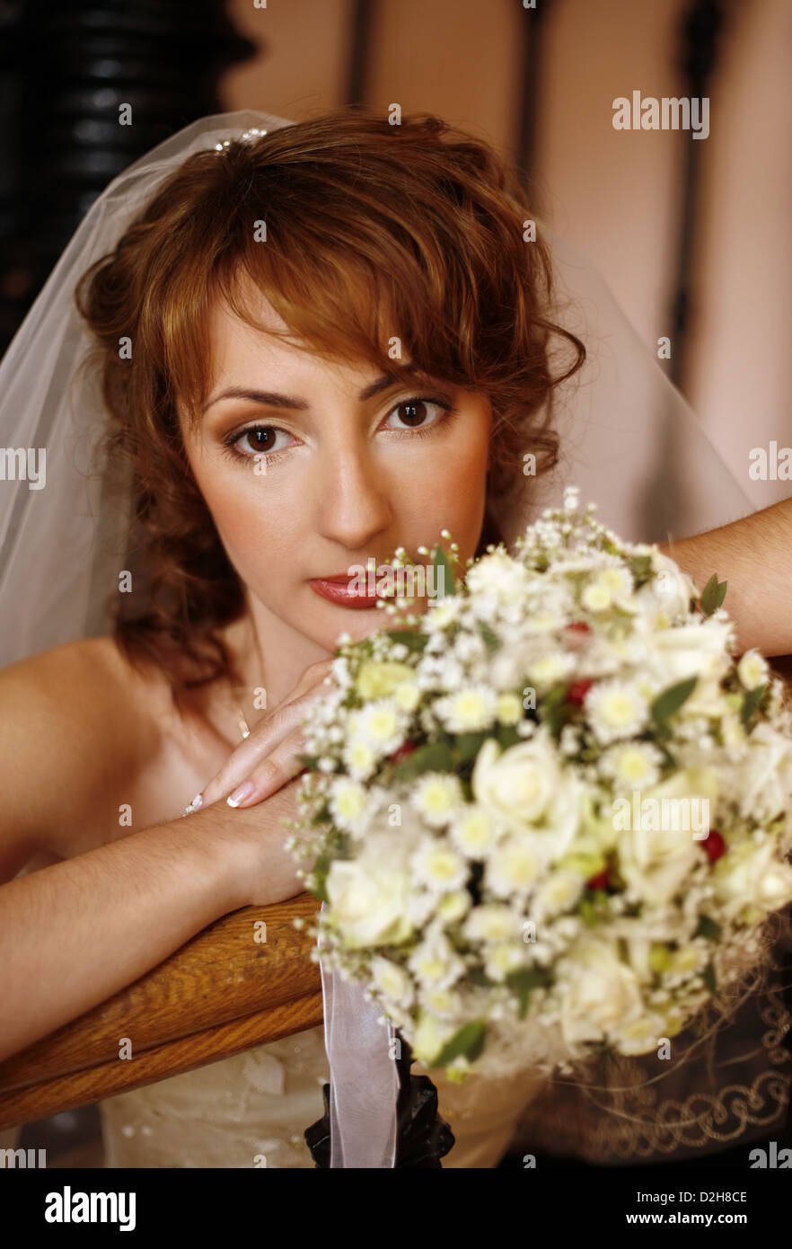 Portrait of the beautiful bride with a bouquet Stock Photo - Alamy