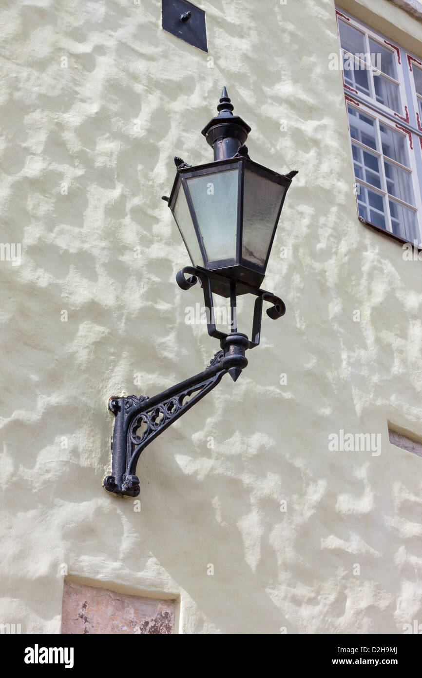 Street old lamp on the wall background Stock Photo - Alamy