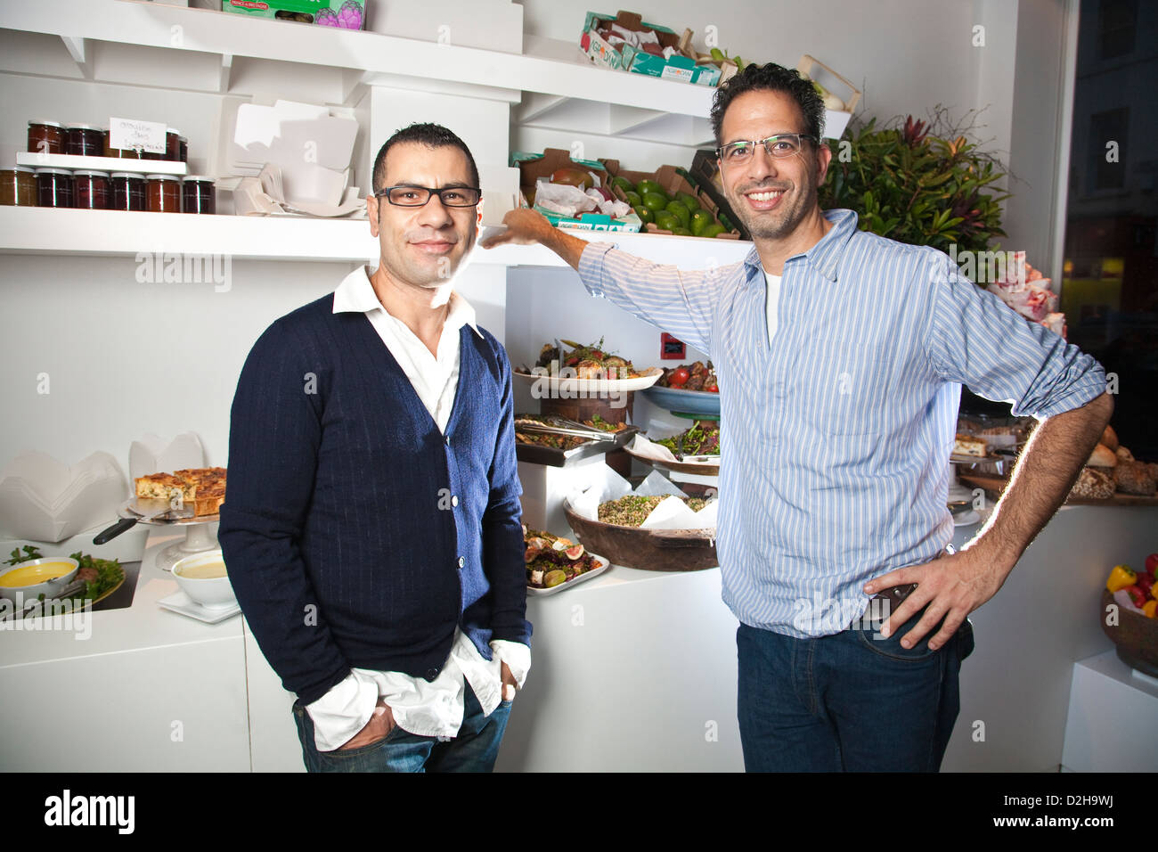 Restaurant owner Yotam Ottolenghi (right) with Sami Tamimi head chef at the Upper Street restaurant in Islington, London, UK Stock Photo