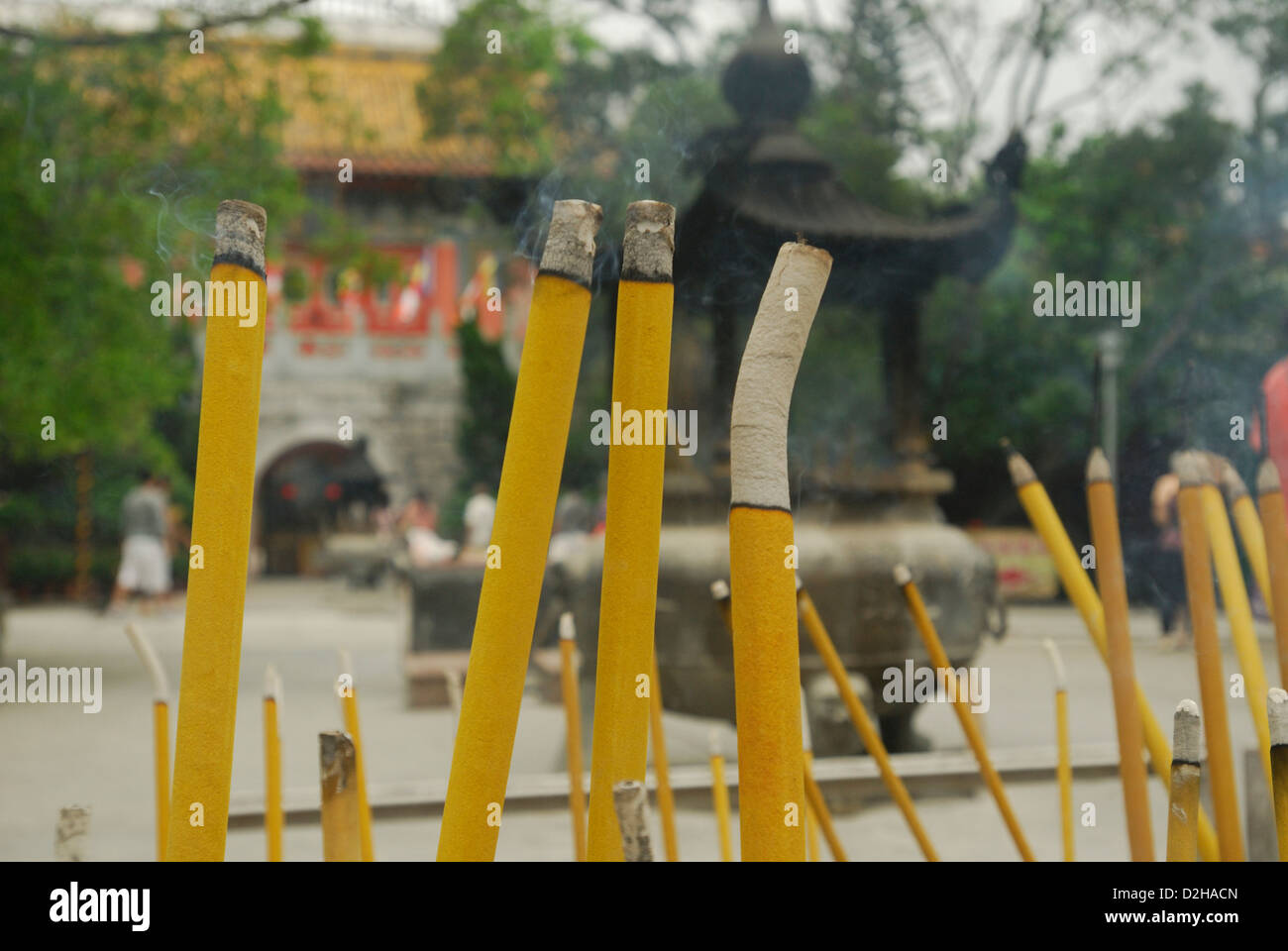 Buddhist ritual of Incense offerings placed in a censer at the entrance of Po LIn Monastery