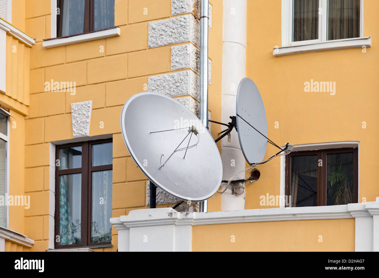 Satellite dishes mounted on the house Stock Photo Alamy