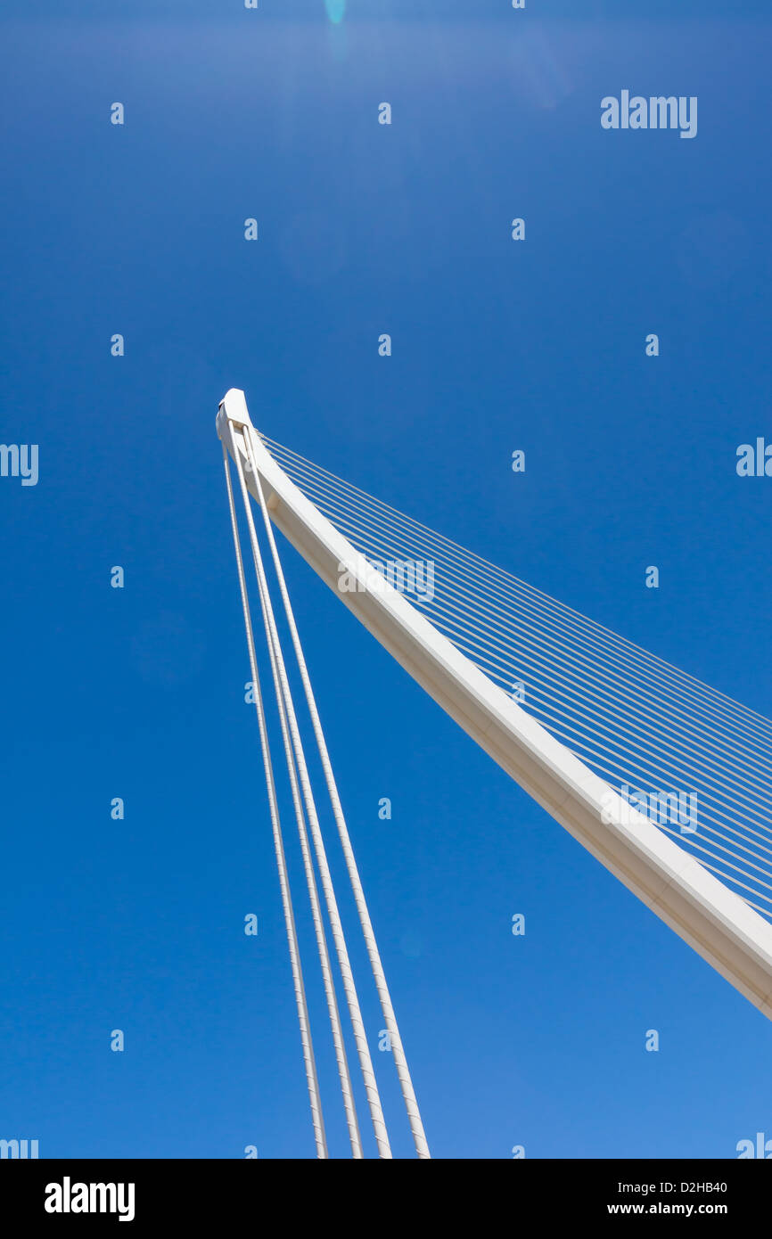 Suspension bridge with cables reaching to the deck of the bridge from the columns Stock Photo