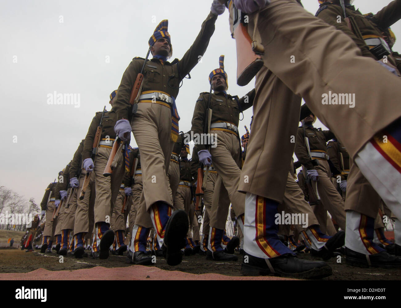 Jan. 24, 2013 - Kashmir, India - Indian policemen march during Indian Republic Day parade dress rehearsals at Bakshi Stadium.  The Republic Day Parade is on January 26 and marks the adoption of the constitution of India and the transition from a British Domination into a Republic. (Credit Image: © Altaf Zargar/ZUMAPRESS.com) Stock Photo