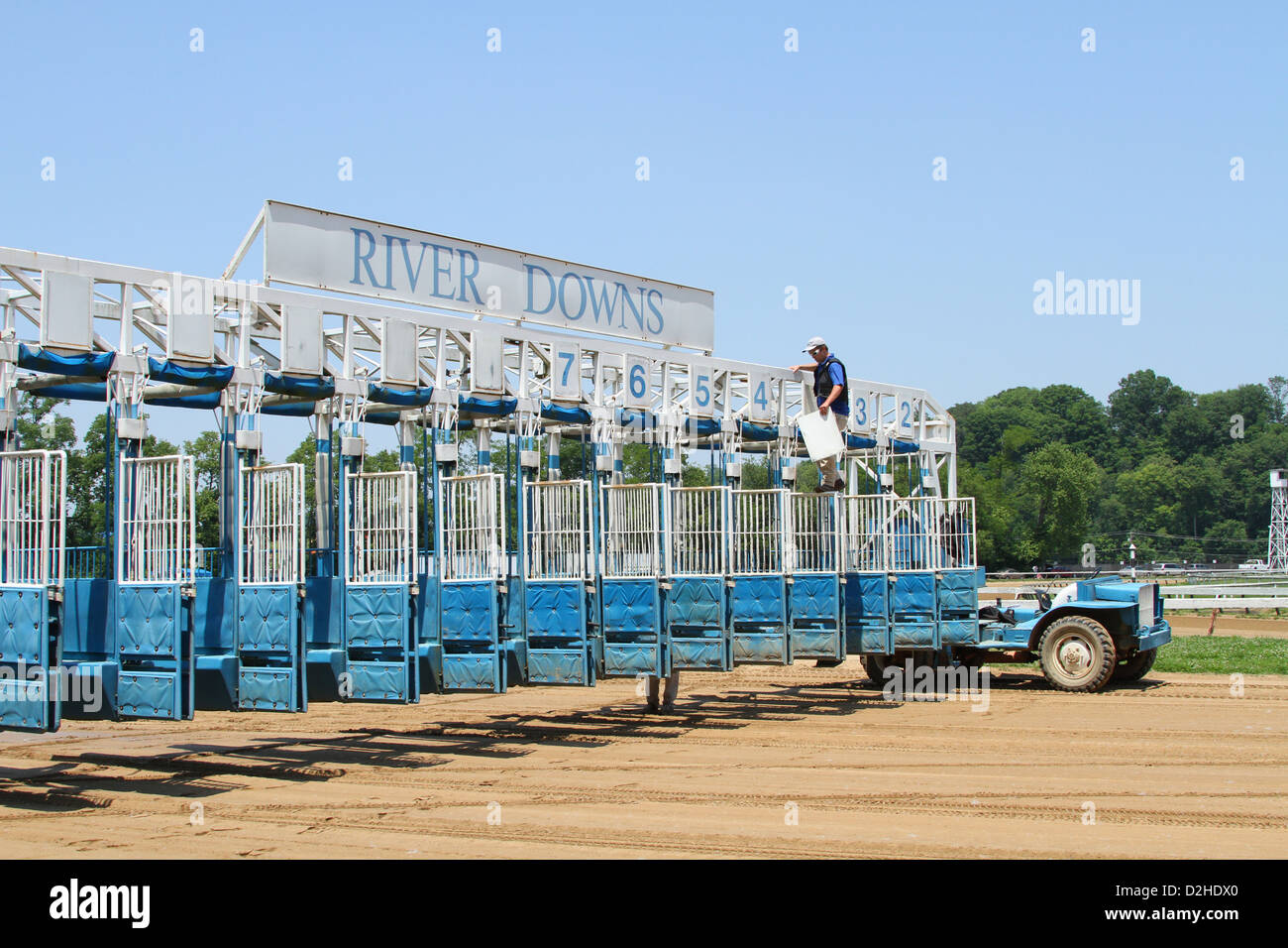 Track worker prepares the Starting Gate. Horse Racing at River Downs track, Cincinnati, Ohio, USA. Stock Photo