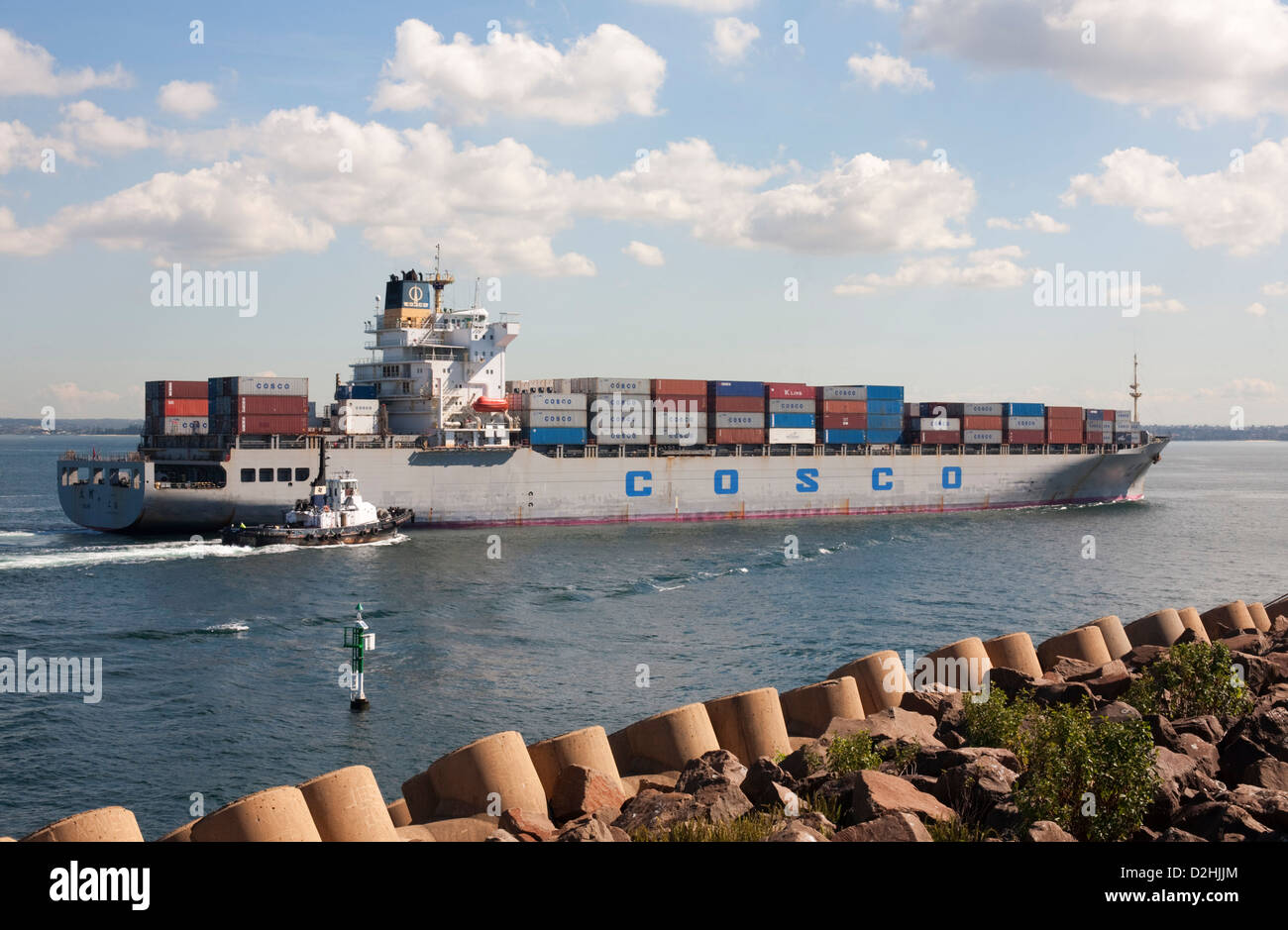 Port Botany tugboat assisting containership to its berth at Port Botany Container Terminal