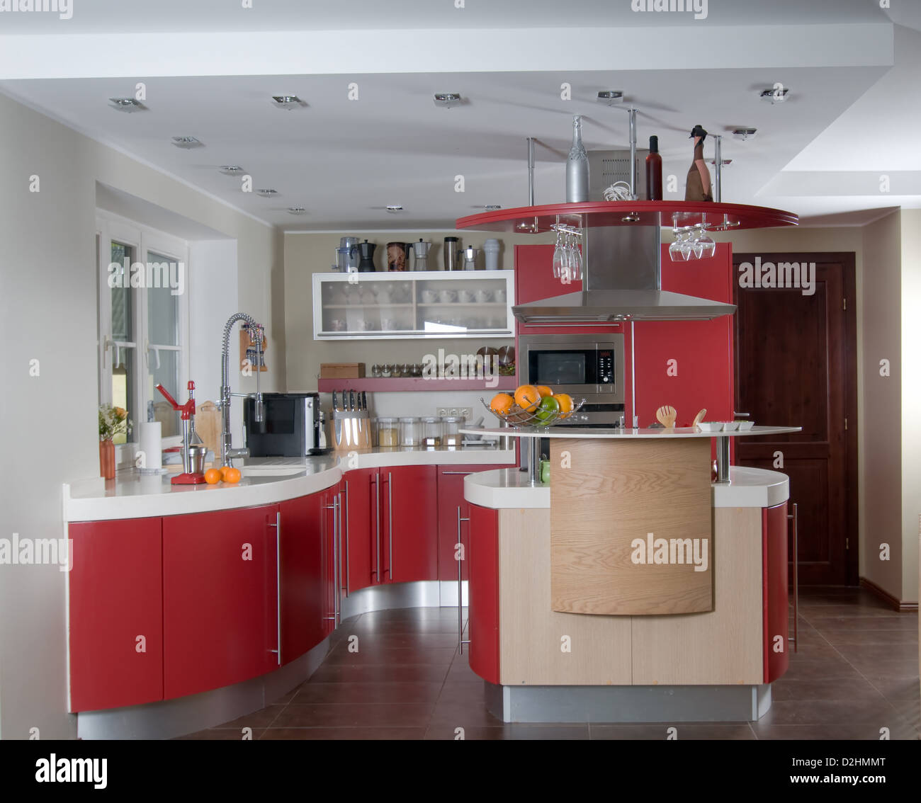 Shot of beautiful red modern kitchen, interior Stock Photo - Alamy