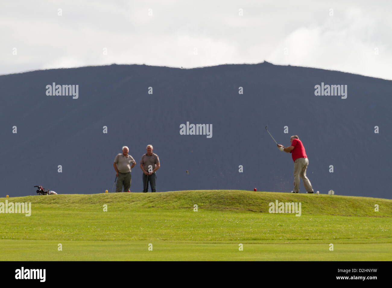 Men playing golf in Stromness, Orkney isles Stock Photo