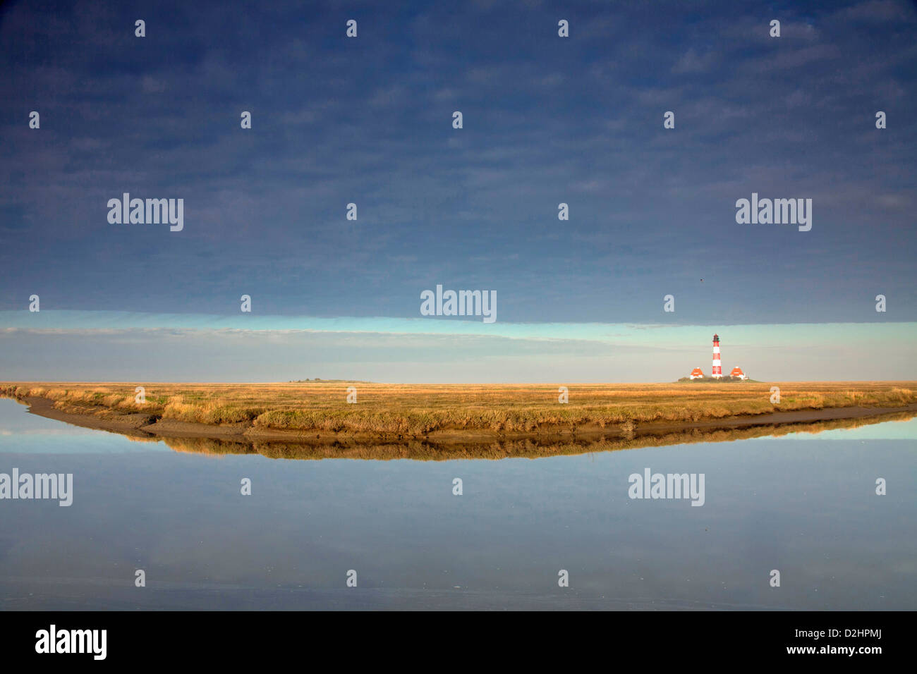 The lighthouse Westerheversand is a major landmark on the peninsula of Eiderstedt, North Frisia. Germany Stock Photo