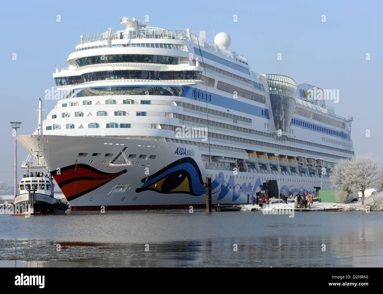 The new AIDAStella cruise liner is shifted after it has left the dock of the Meyer shipyard in Papenburg, Germany, 25 January 2013. Photo: INGO WAGNER Stock Photo
