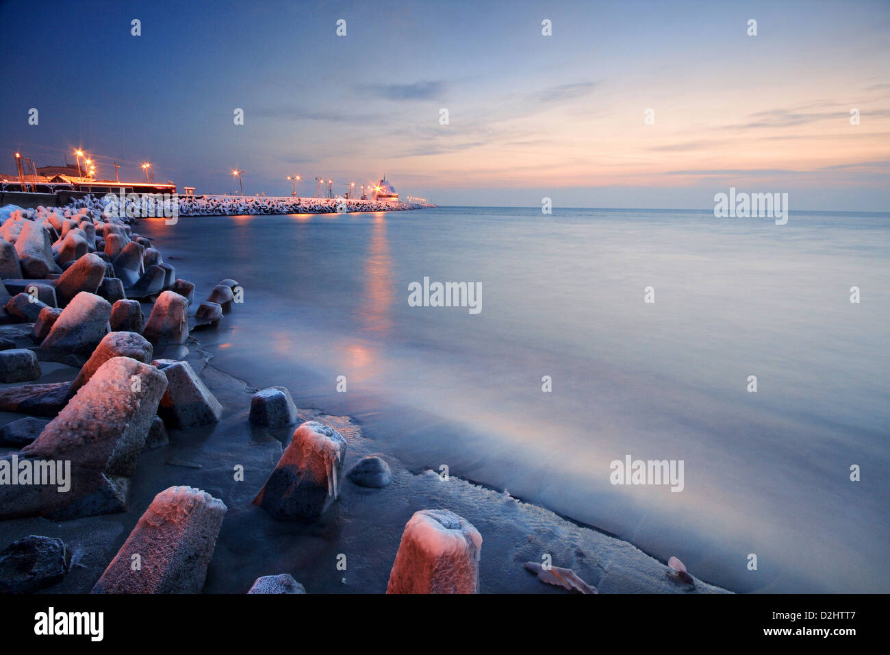 Beautiful winter evening on a frozen beach in Hel Peninsula, Polish Baltic coast. Stock Photo