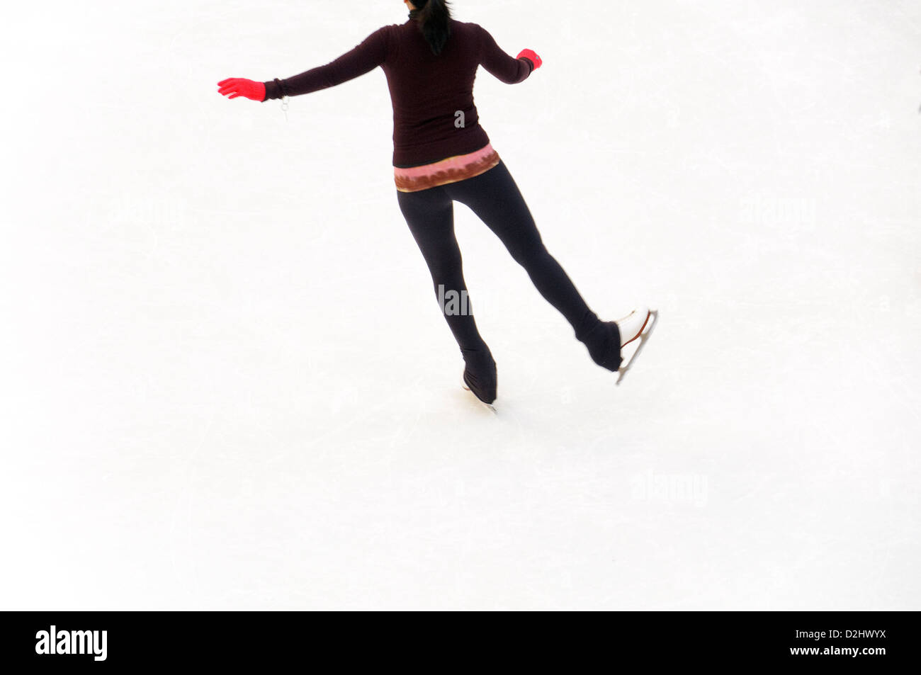 Ice Skating during the Christmas holiday at Rockefeller Center, Manhattan, New York City, USA Stock Photo