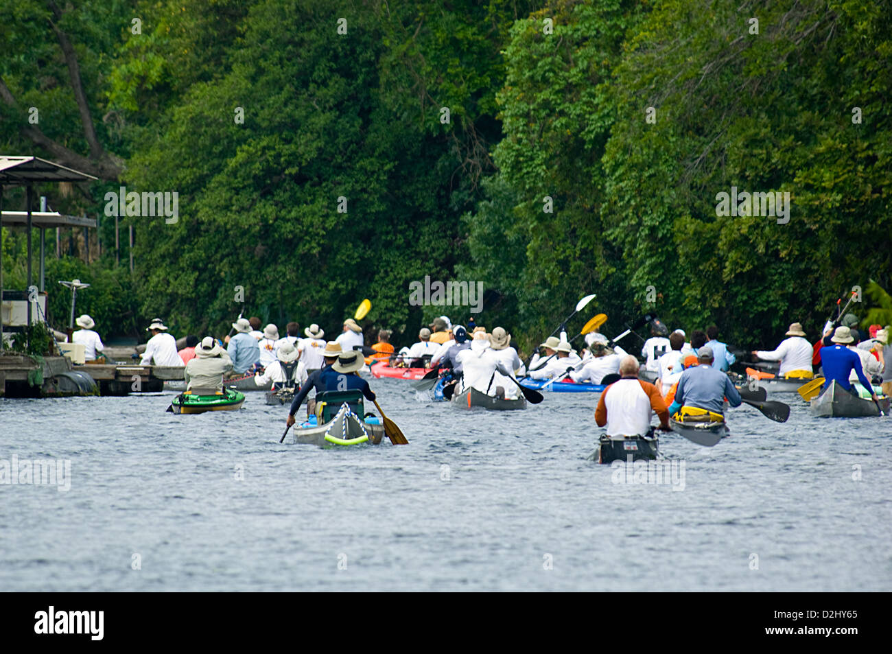 Racers leaving the starting line at the Texas Water Safari canoe race, San Marcos Texas Stock Photo