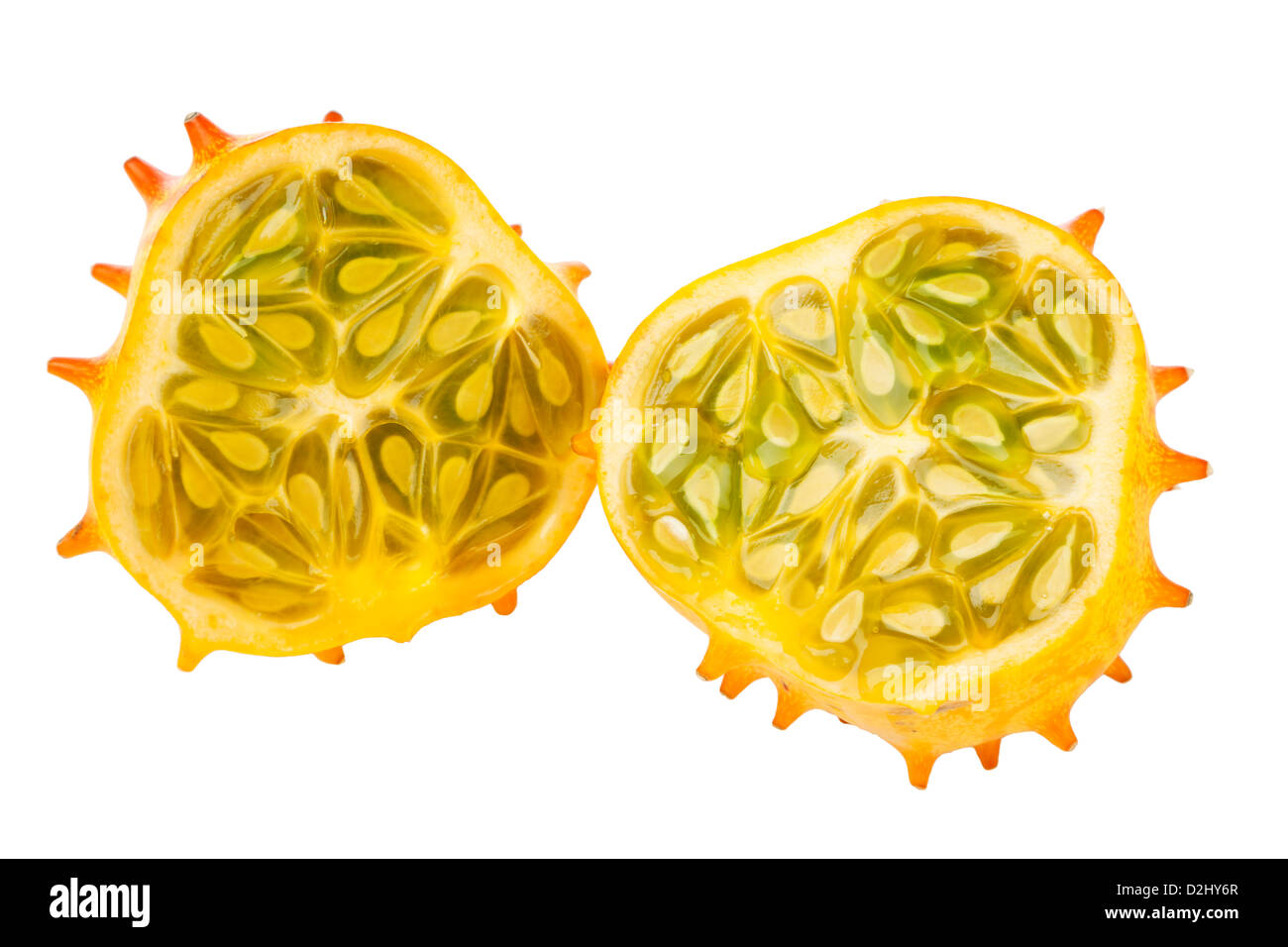 Halved Kiwano fruit, also called African Horned melon or Horned Cucumber, isolated on white background Stock Photo