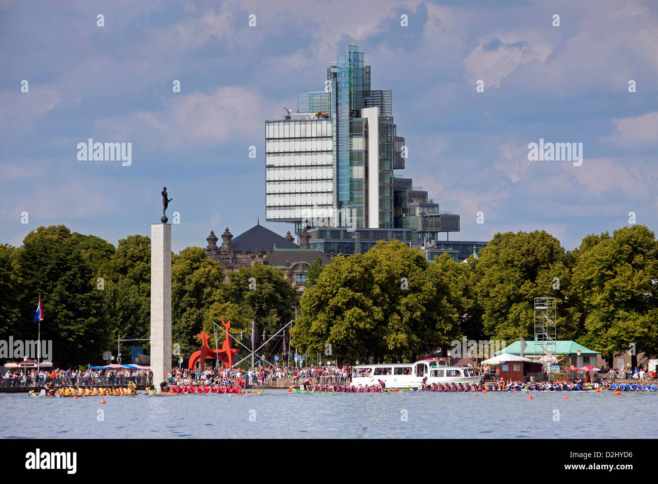 Dragonboat race on artificial lake Maschsee and the Norddeutsche Landesbank in the background, Hanover, Lower Saxony, Germany Stock Photo
