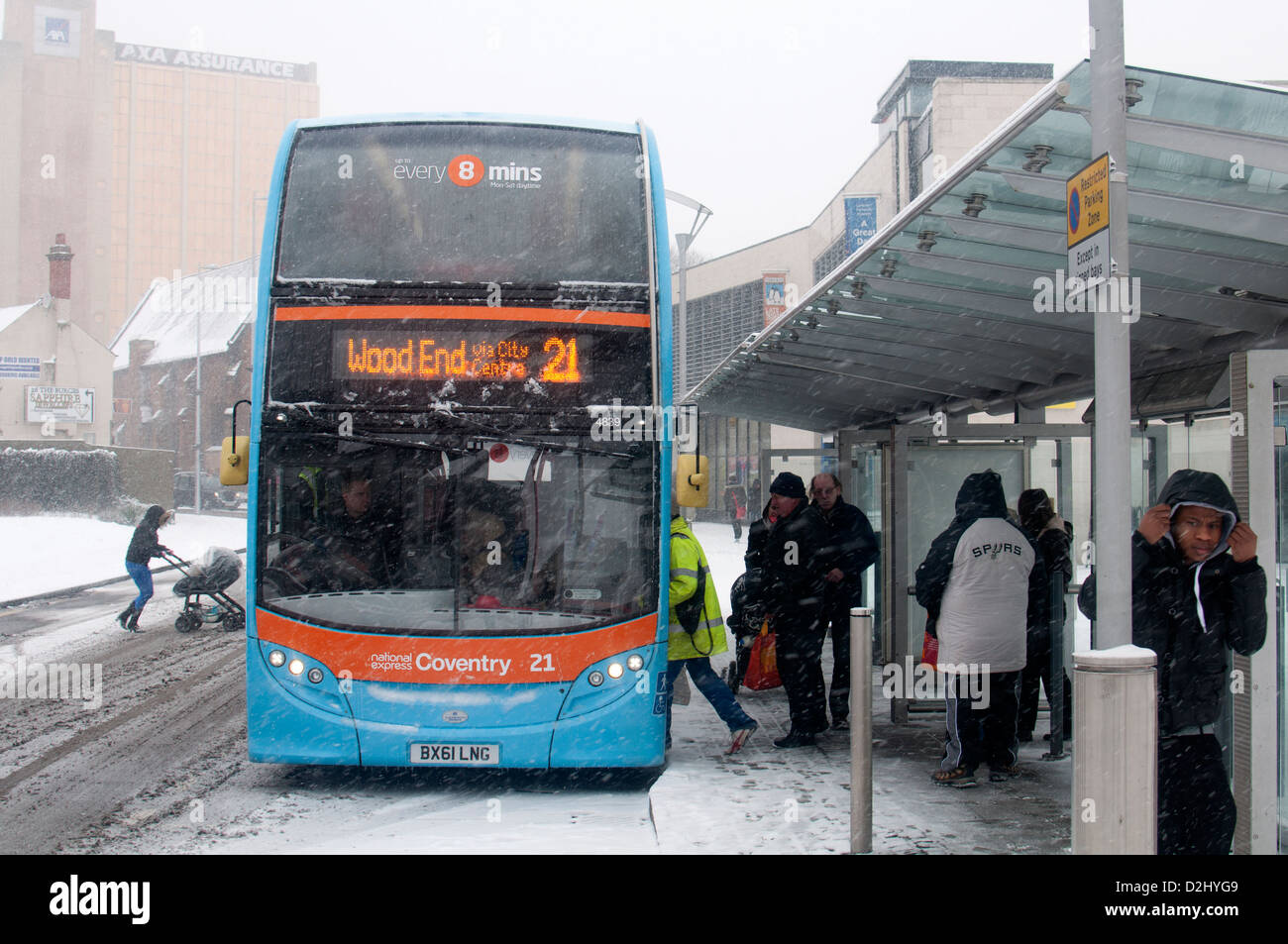 Bus in snowy weather, Coventry city centre, UK Stock Photo