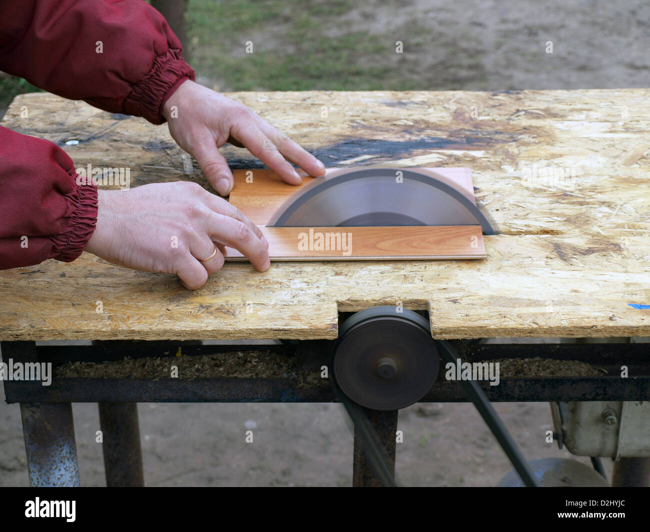 Sawing laminate floorboards by homemade circular saw Stock Photo - Alamy