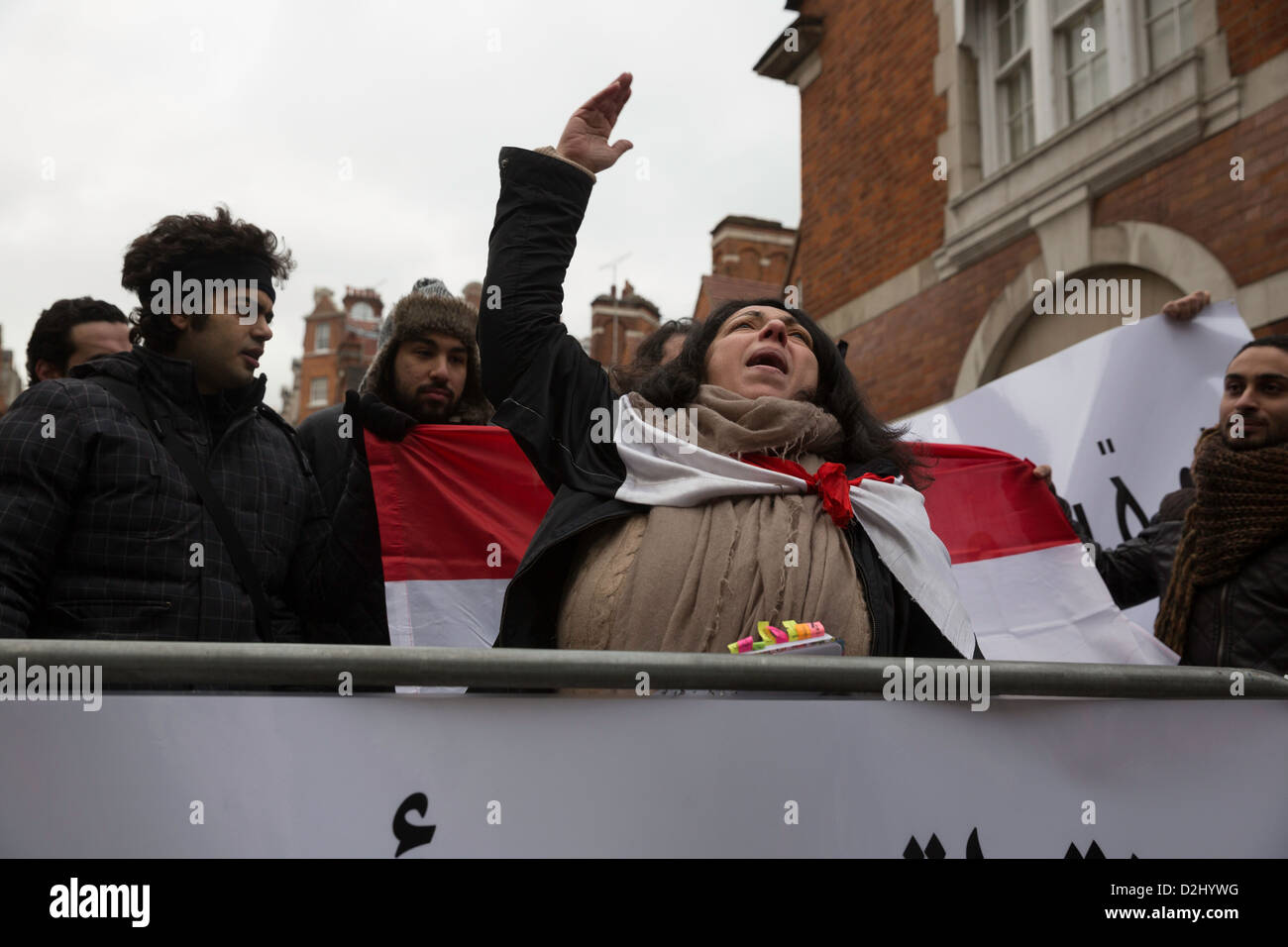Protesters chanting slogans in arabic outside the Egyptian embassy Stock Photo