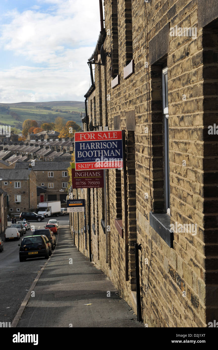 Street of terraced housing for sale, Skipton North Yorkshire UK Stock