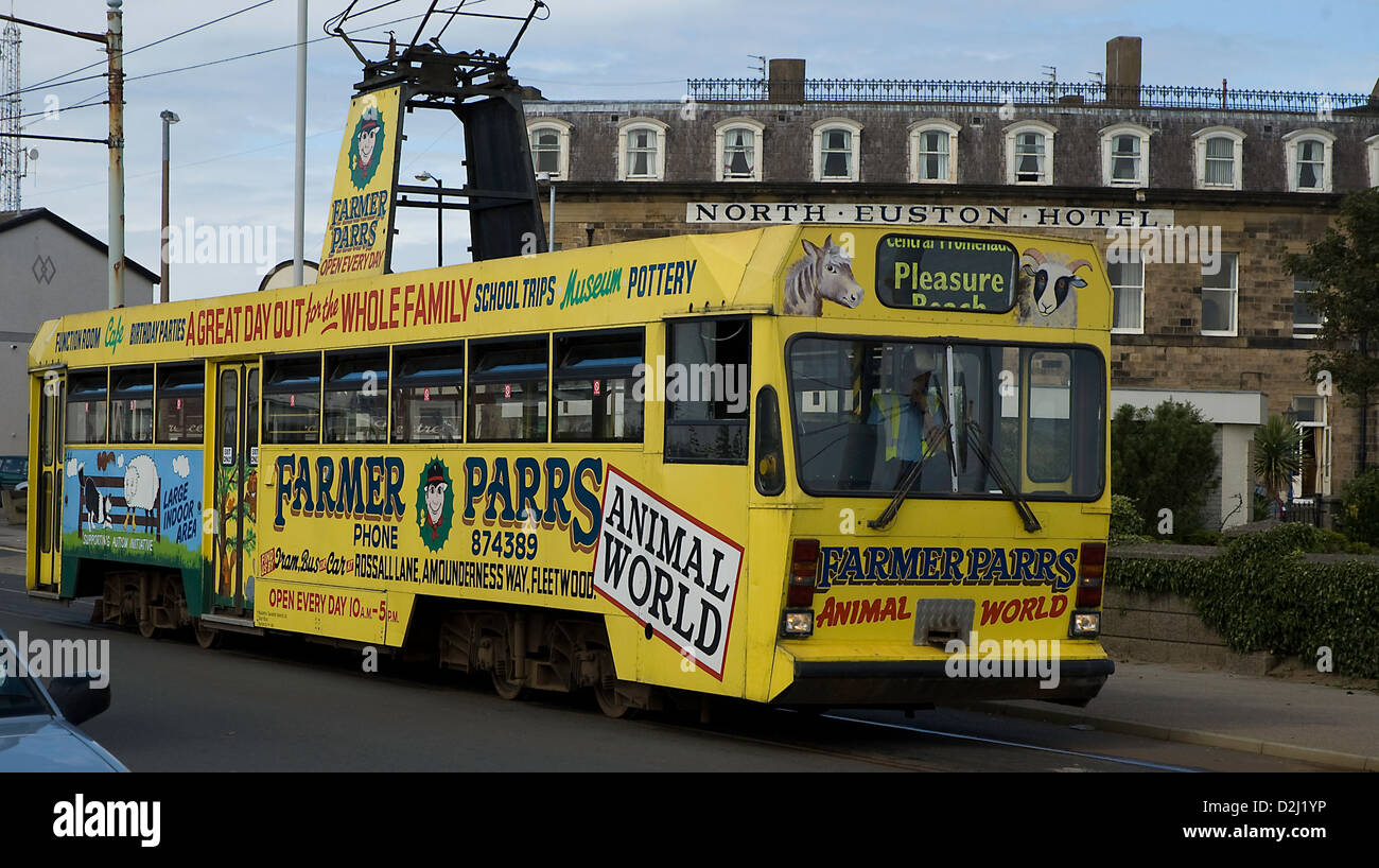 Single deck centenary blackpool tram at Fleetwood ferry farmer parrs livery with north Euston hotel in background Stock Photo