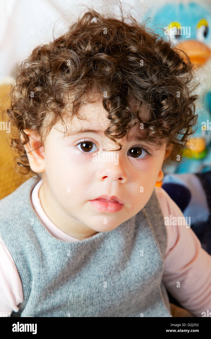 Two Year Old Girl With Curly Hair Portrait Studio Shot Stock Photo Alamy 6-year-old-girl-short-haircuts-google-search-cuteshortgirlhairstyles