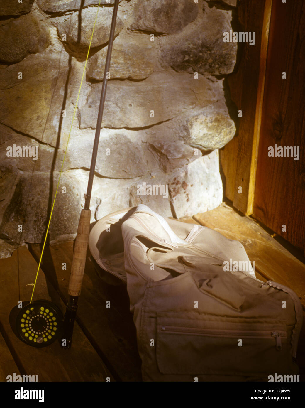 Cabin setting for a fly rod and fishing vest Stock Photo Alamy