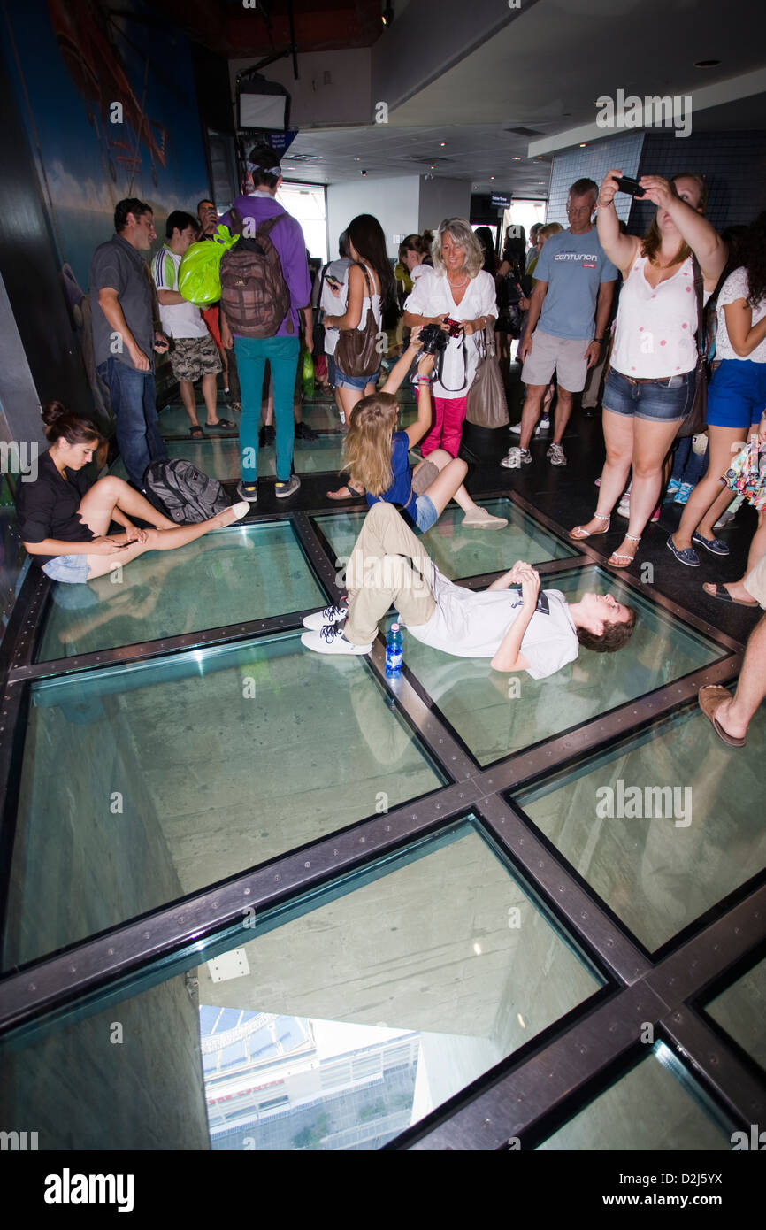 The glass floor of the cn tower in toronto hi-res stock photography and ...