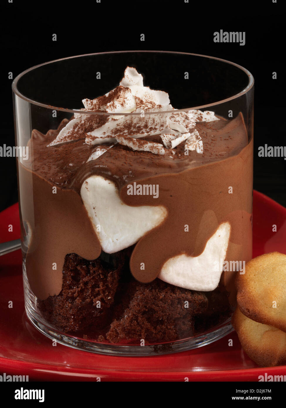 Romantic sharing chocolate mousse dessert tuile biscuits hires stock