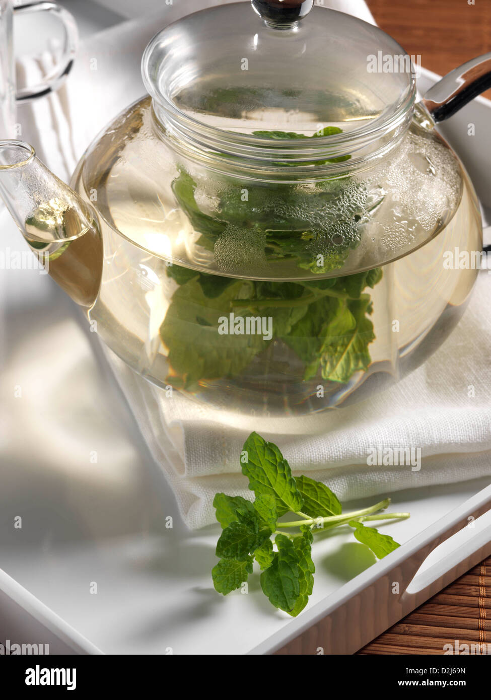 Mint tea in a glass teapot Stock Photo Alamy