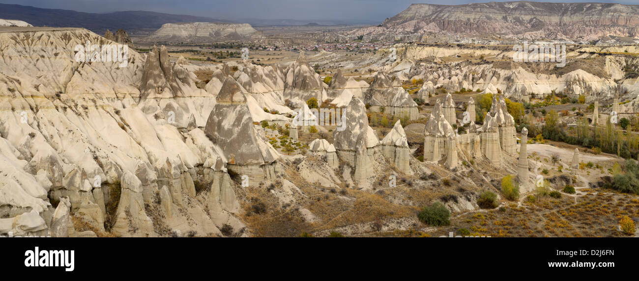 Panorama of phallic Fairy Chimneys in Love Valley Goreme National Park Turkey and Cavusin village Stock Photo