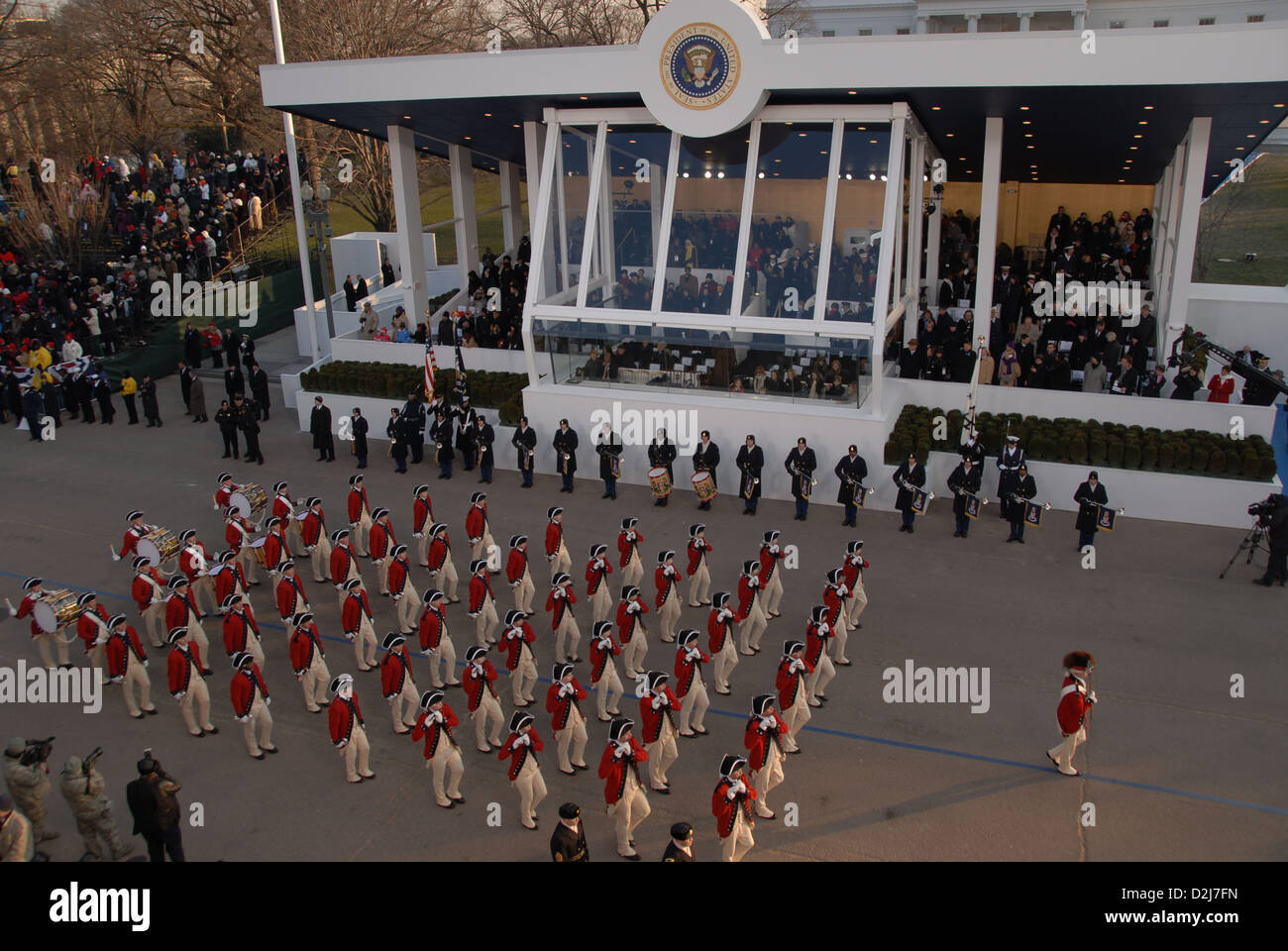 The US Army Old Guard Fife and Drum Corps march past the presidential