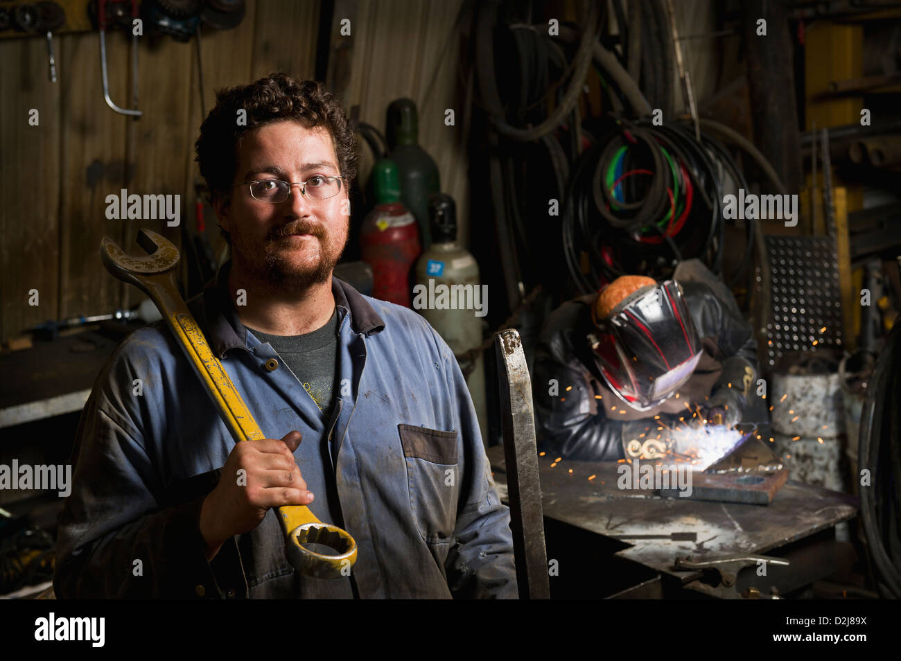 A mechanic and a welder; edmonton alberta canada Stock Photo Alamy