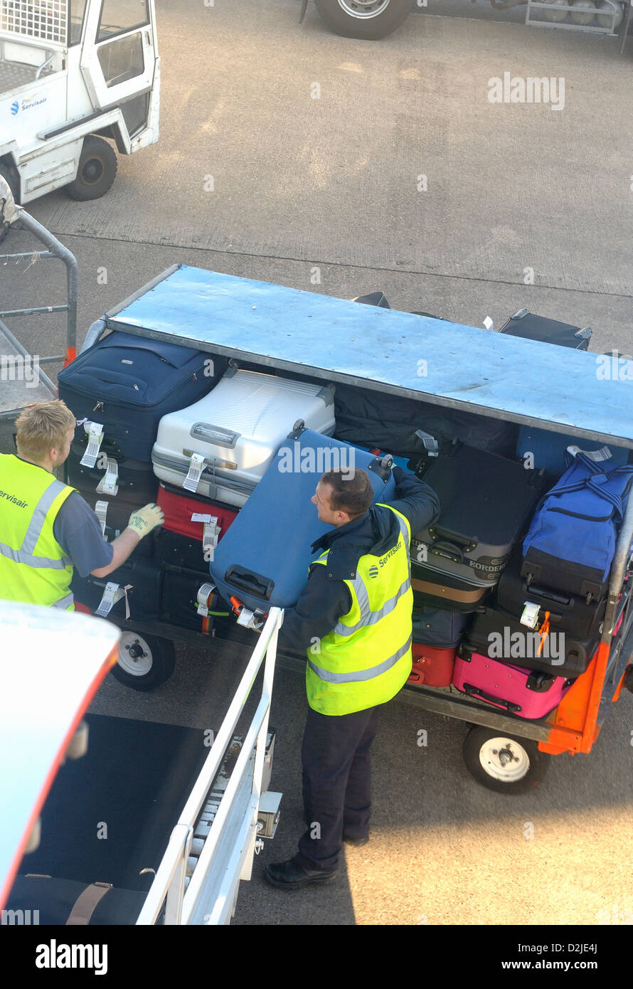 luggage being loaded at east midlands airport england uk Stock Photo