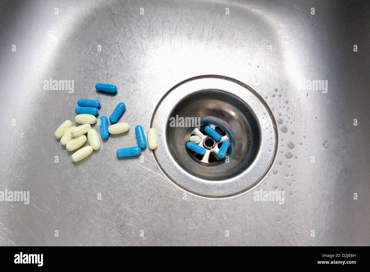 tablets down the sink Stock Photo