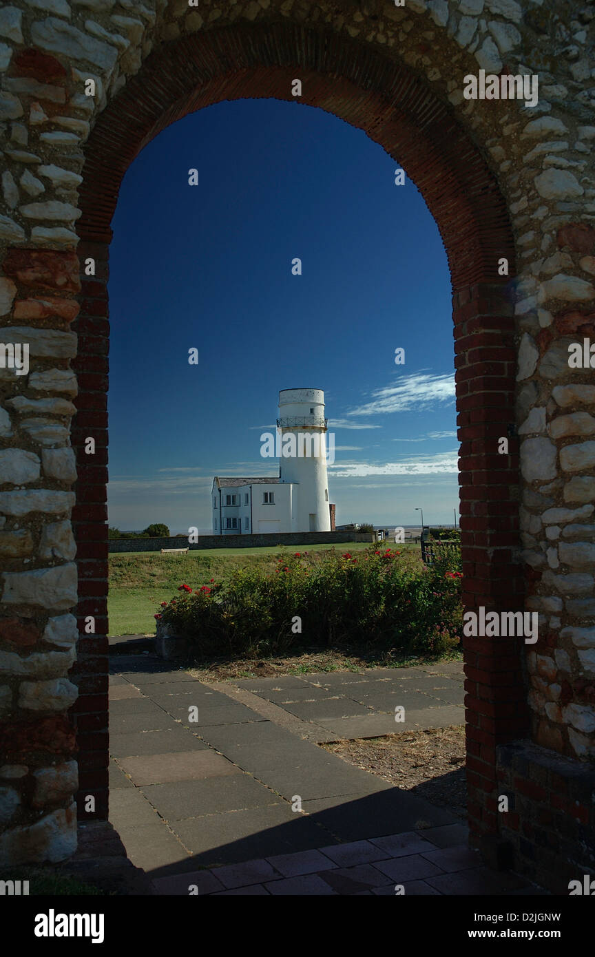 Old Hunstanton light house through gate with blue sky Stock Photo Alamy
