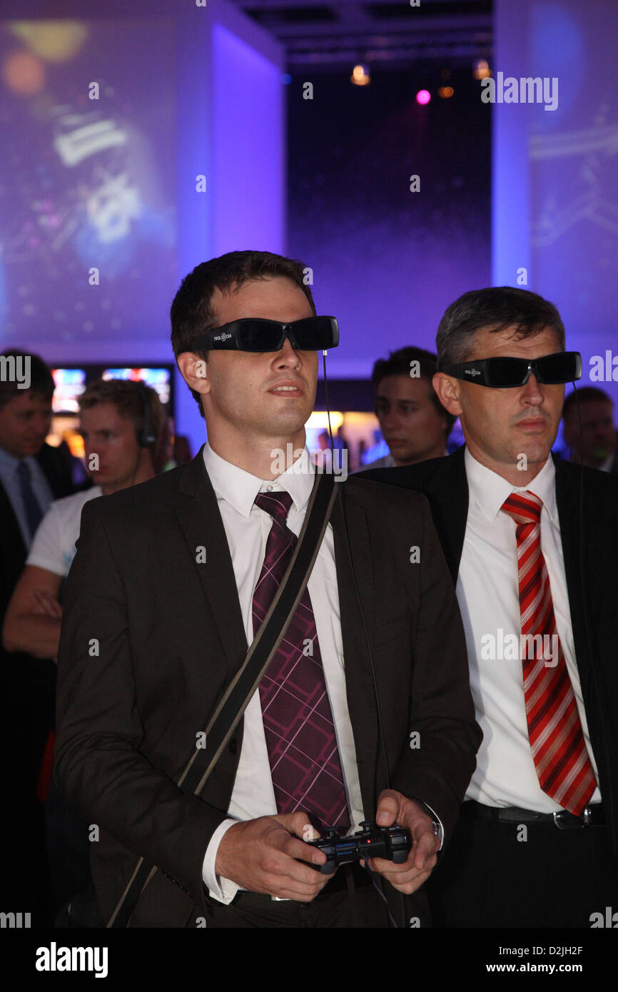 Berlin, Germany, visitors at IFA with 3D Eyewear play PlayStation 3 Stock Photo