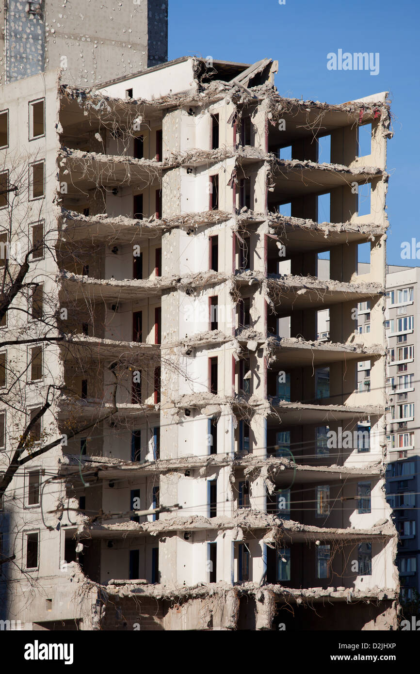 Halfway finished demolishing of a multi-storey old apartment building in Warsaw, Poland. Stock Photo