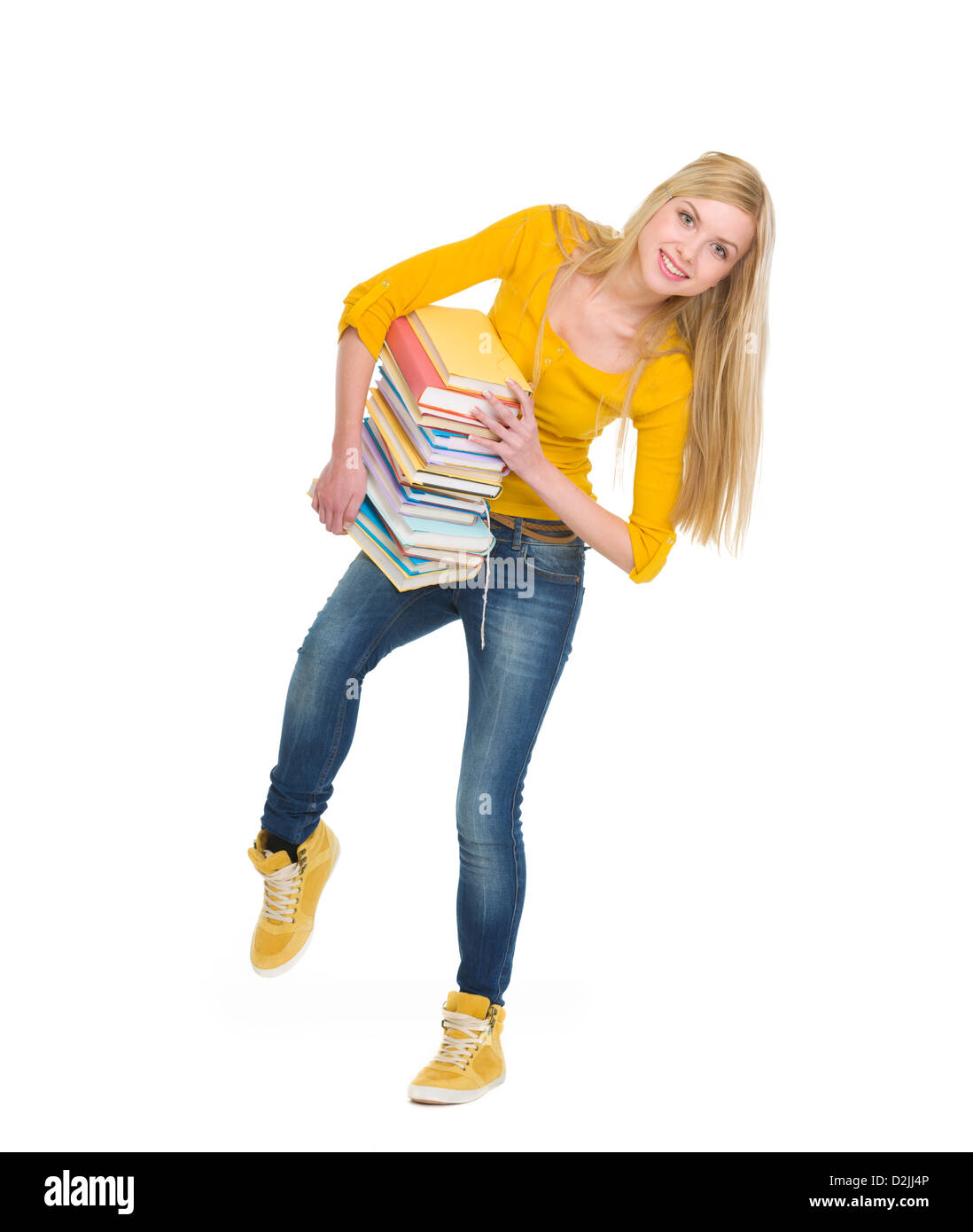 Full length portrait of student girl holding pile of books Stock Photo ...