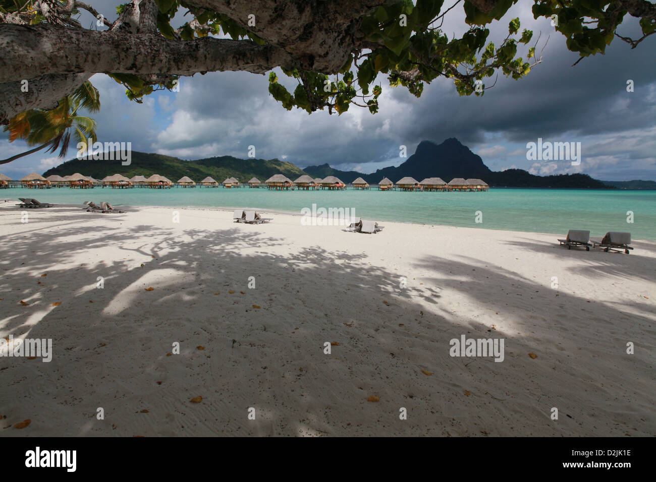 Overwater bungalows on the lagoon at Bora Bora Stock Photo