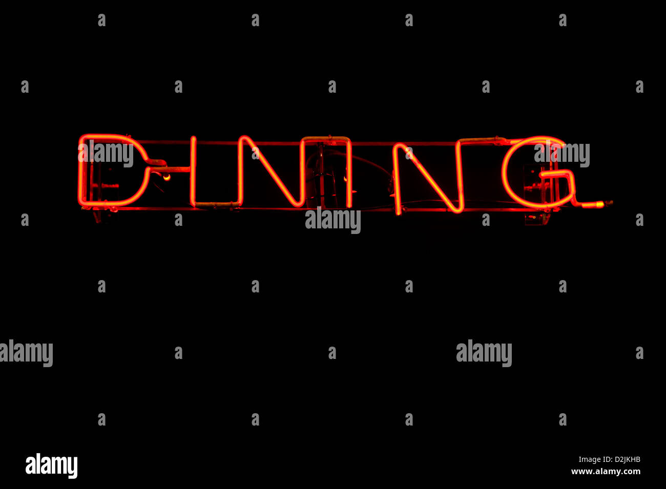 Neon light sign showing the word Dining Stock Photo