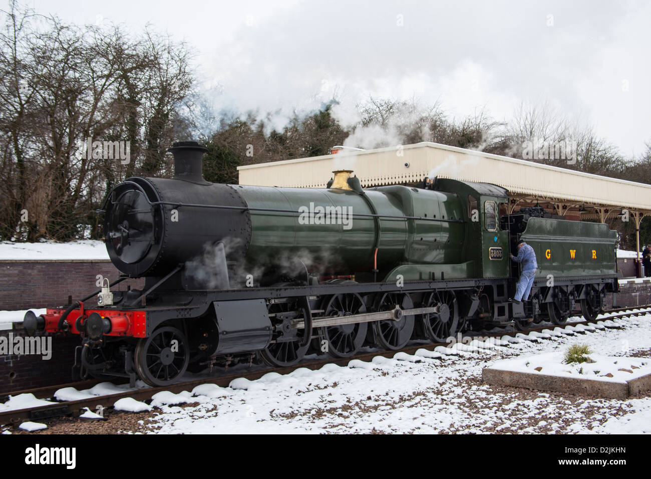 Steam locomotive GWR 280 freight 3803 at Leicester North station in the snow. Stock Photo