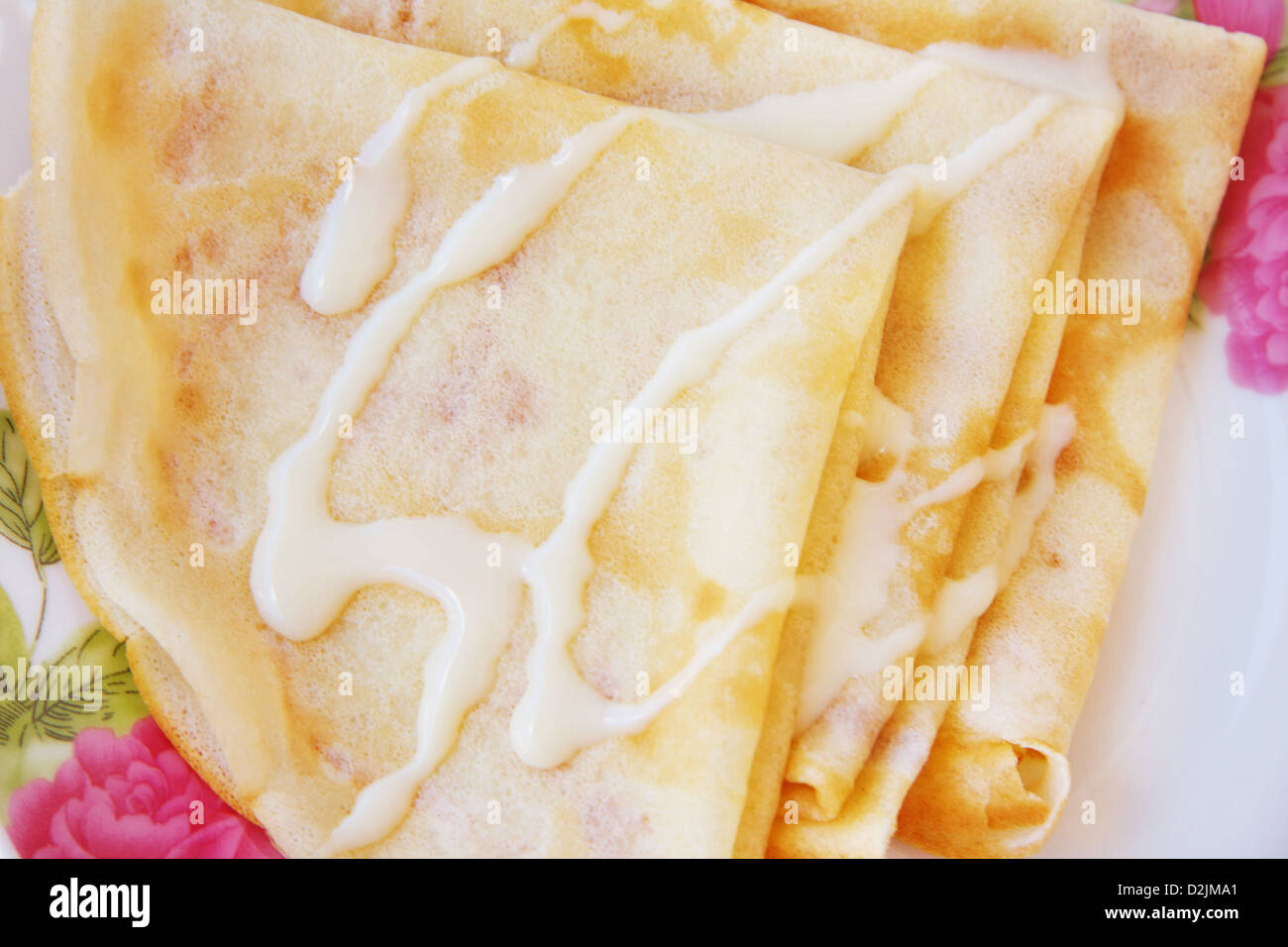 Pancakes with condensed milk Stock Photo Alamy