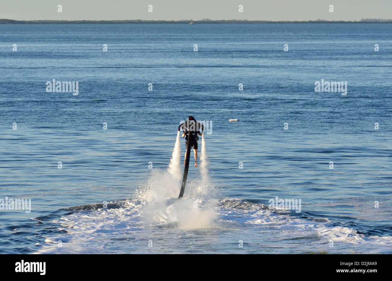 A man trying out a water jet pack. Florida, USA. Stock Photo
