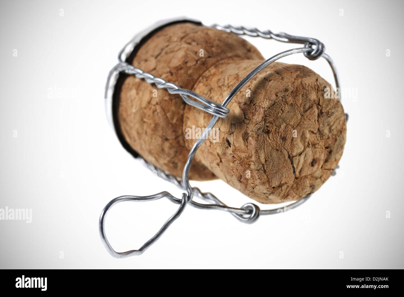 A sparkling wine cork opened in celebration on a white background Stock