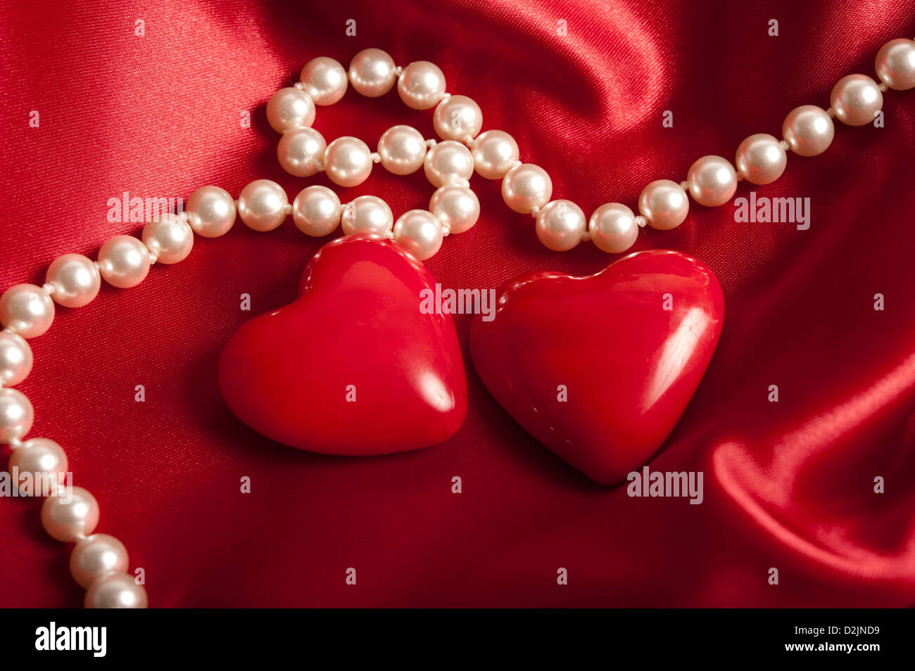 pearls necklace with two heart shapes, valentine concept Stock Photo
