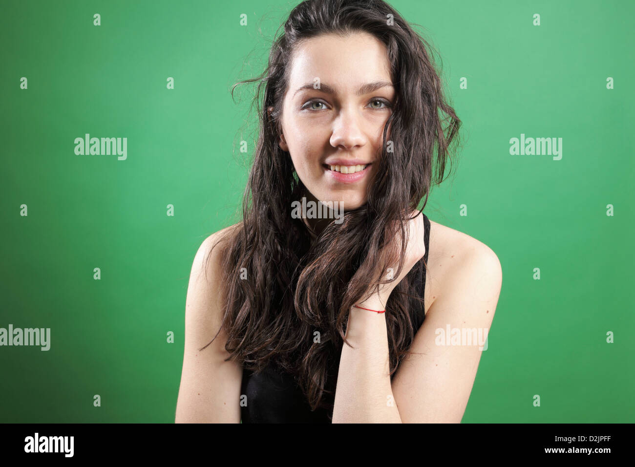 Smiling teenager girl studio hi-res stock photography and images - Alamy