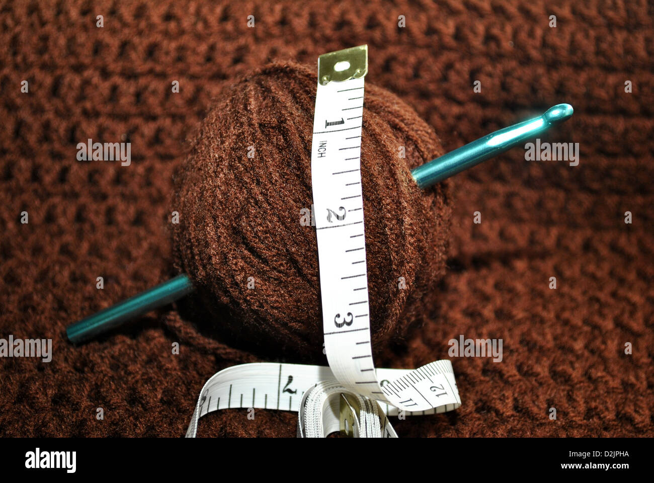 Measuring A Ball of Yarn Stock Photo