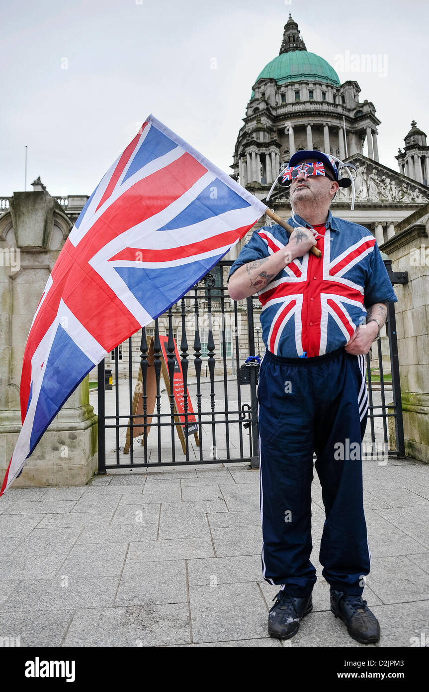 Belfast, Northern Ireland, UK. 26th January 2013.   A man holding a union flag and wearing a union flag shirt, is one of 500 protesters gathered at Belfast City Hall to protest against the removal of the Union Flag from the building. Credit:  Stephen Barnes / Alamy Live News Stock Photo