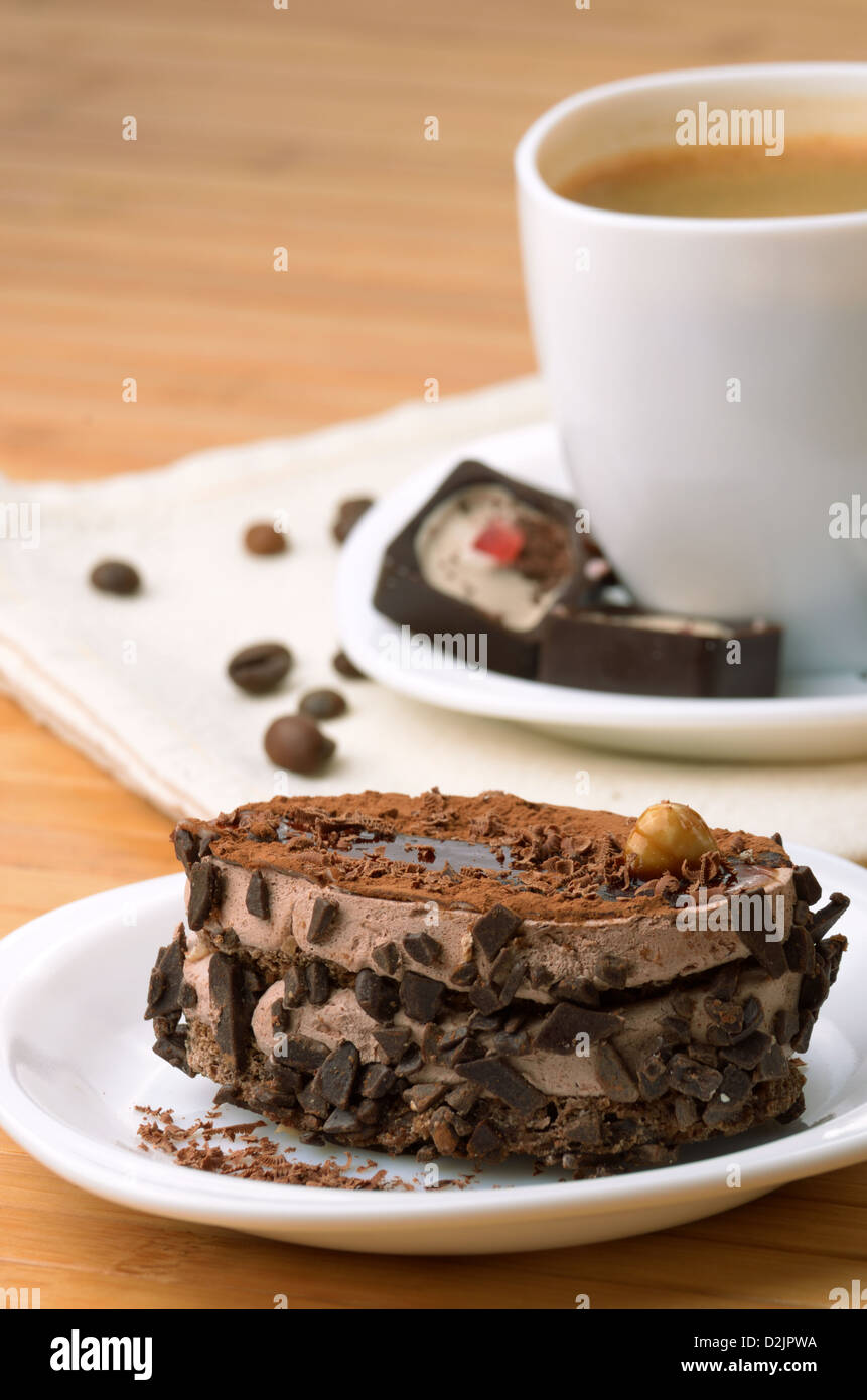 Chocolate dessert cake with coffee cup aside Stock Photo