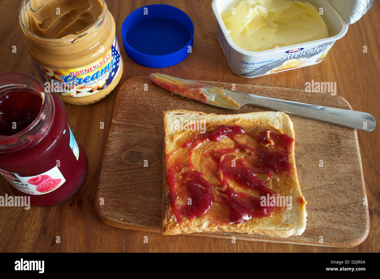 Peanut butter, jam on toast Stock Photo Alamy